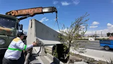 عملیات نصب نیوجرسی‌های بتنی در بزرگراه آزادگان