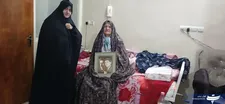 مادر شهید علیرضا نژادعبدالله تجلیل شد